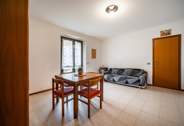 Charming Three-Room Apartment with Garden in Mandello del Lario