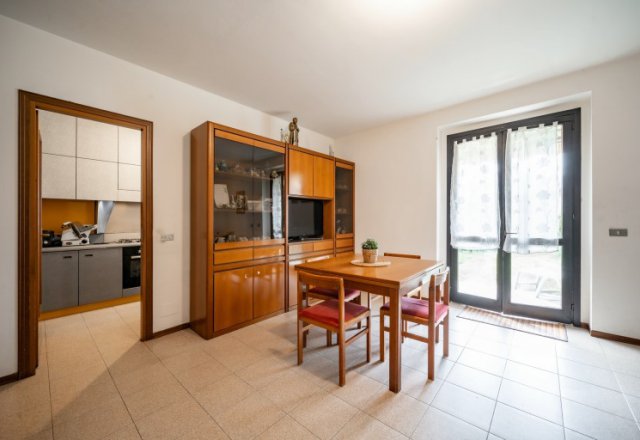 Charming Three-Room Apartment with Garden in Mandello del Lario
