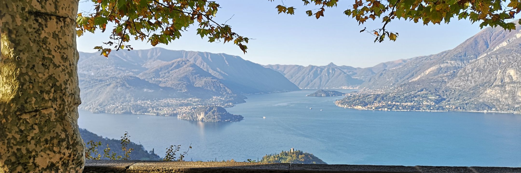 Lake Como panorama with villas and landscapes, symbolizing property and vacations